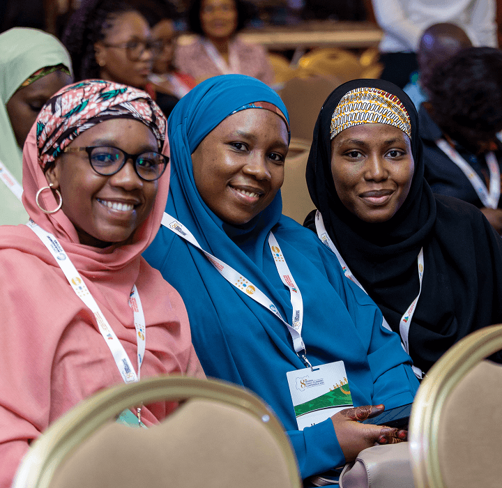 Conference participants smiling